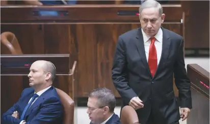  ?? ( Yonatan Sindel/ Flash90) ?? YAMINA HEAD Naftali Bennett came within spitting distance of Prime Minister Benjamin Netanyahu last week, when a Channel 12 poll showed the difference between the two was only three seats.