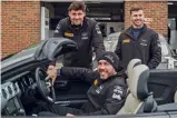  ??  ?? 2021 Academy Motorsport team: team principal Matt Nicoll-Jones (seated) and drivers Will Moore (left) and Matt Cowley (right)