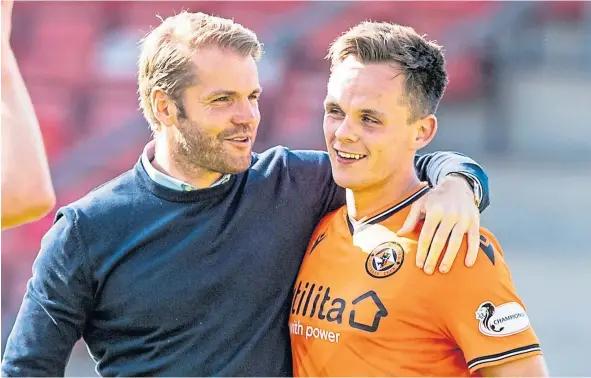  ??  ?? Dundee United boss Robbie Neilson with former Ayr United striker Lawrence Shankland – now starring for the Tangerines.