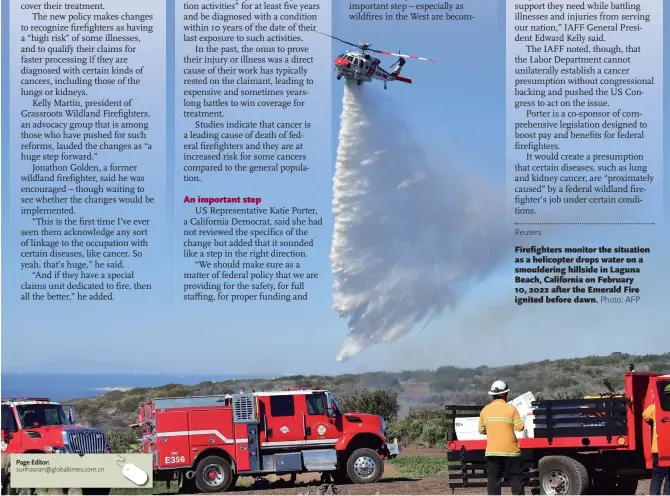  ?? Photo: AFP ?? Page Editor:
Firefighte­rs monitor the situation as a helicopter drops water on a smoulderin­g hillside in Laguna Beach, California on February 10, 2022 after the Emerald Fire ignited before dawn.