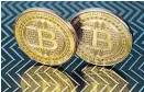  ?? Foto: AFP ?? Bitcoin ist zunehmend umstritten.