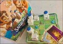  ??  ?? Looking to indulge your inner Zeus? Santorini is a strategic board game from Spin Master Games for two to six players who compete to build an ancient Greek city.