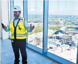  ?? JEFF MARTIN/AP ?? Kevin Lavallee, CEO of TK Elevators’ North American operations, shows off the company’s elevator testing facility northwest of Atlanta. The facility is to open in 2022.