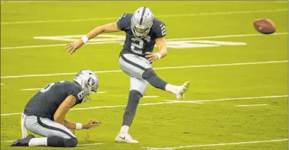  ?? L.E. Baskow Las Vegas Review-journal @Left_eye_images ?? The Raiders seem confident in Daniel Carlson (2), but they did add kicker Dominik Eberle to the practice squad.