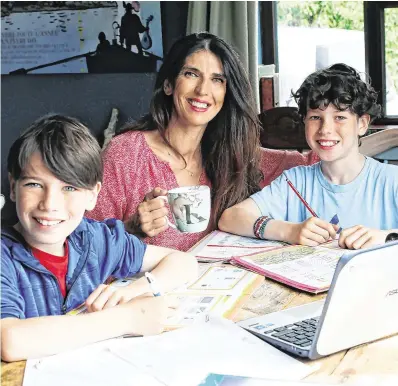  ?? PHOTO: LORCAN DOHERTY ?? Quality time: Kathy Donaghy with her sons Oirghiall and Dallan.