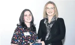  ??  ?? Natalia Bartolome receives her award from Susan Rae.