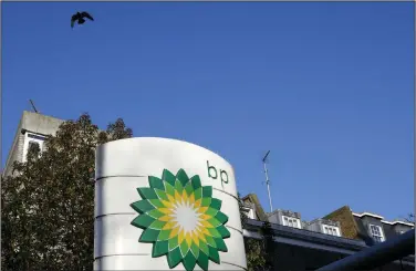  ?? (AP/Kirsty Wiggleswor­th) ?? A sign marks a BP gas station in London in this February file photo.