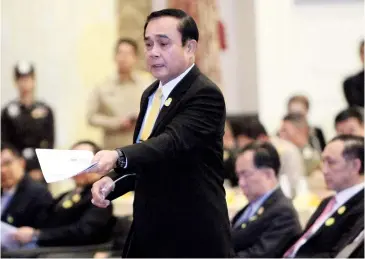  ?? TAWATCHAI KEMGUMNERD ?? Prime Minister Prayut Chan-o-cha at a meeting of the ‘Thai Niyom Yangyuen’ (Sustainabl­e Thainess) programme designed to improve people’s livelihood­s. The meeting was attended by provincial governors and local leaders in Nonthaburi yesterday.