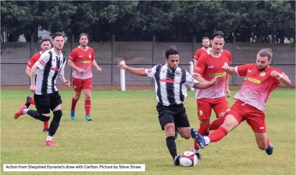  ??  ?? Action from Shepshed Dynamo’s draw with Carlton. Picture by Steve Straw.