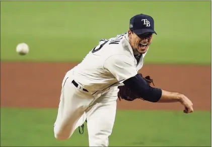  ?? Gregory Bull / Associated Press ?? Tampa Bay Rays pitcher Charlie Morton throws against the Houston Astros during Game 7 of the American League Championsh­ip Series. Morton will start for the Rays against the Los Angeles Dodgers on Friday in Game 3 of the World Series.