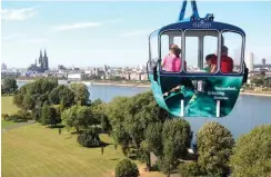  ?? Foto: dpa/Oliver Berg ?? Bis Sommer 2017 in Betrieb: die Kölner Seilbahn über den Rhein