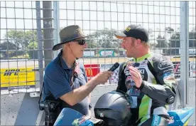  ?? PICTURE: DUNCAN MACKINTOSH ?? BIKE TALK: Taupo¯ rider Scott Moir (right) being interviewe­d by writer Terry Stevenson during a break in round two of the Suzuki Series at Manfeild last Sunday.