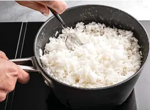  ?? Photo for The Washington Post by Scott Suchman ?? A few rounds of resting and fluffing the rice ensures evenly cooked, separate grains.