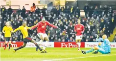  ??  ?? Manchester United’s Belgian striker Romelu Lukaku (C) misses a chance during the English Premier League football match betweenWat­ford and Manchester United atVicarage Road Stadium in Watford, north of London on November 28, 2017. - AFP photo