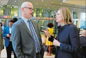  ?? AP FILE PHOTO ?? Big East commission­er Val Ackerman talks with UConn men’s basketball coach Dan Hurley at Madison Square Garden in New York last June when it was announced the Huskies would be returning to the conference.