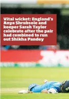  ??  ?? Vital wicket: England’s Anya Shrubsole and keeper Sarah Taylor celebrate after the pair had combined to run out Shikha Pandey