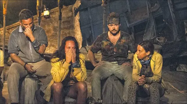  ?? Jeffrey Neira/CBS Entertainm­ent ?? Jeff Varner, left, outed fellow Nuku Tribe member Zeke Smith, right, as transgende­r on “Survivor.” Also at the Tribal Council were Sarah Lacina, left, and Debbie Wanner.