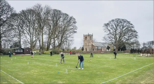  ?? PICTURE: JAMES HARDISTY ?? HOOP DREAMS: Members of Beverley and East Riding Croquet Club practising for their new season at their grounds on the lawns of Rowley Manor Hotel, Little Weighton, Cottingham, near Hull.