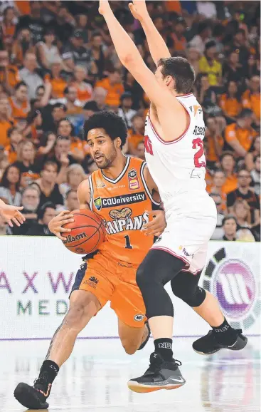  ?? Picture: GETTY IMAGES ?? CLOSE ATTENTION: Melo Trimble of the Taipans drives to the basket during the round 2 NBL match between Cairns and the Illawarra Hawks at Cairns Convention Centre.