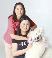  ??  ?? Chuchu Madrigal, breast cancer survivor, with daughter Alex Eduque and their dog Sly