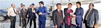  ??  ?? Dr. Dissanayak­e briefing the Japanese Foreign Minister about the Colombo port expansion project. Japanese Ambassador Kenichi Suganuma, Habour Master Capt. Athula Hewawithar­ana and Actg. Chief Manager (C & PR) Nalin Aponso are also in the picture SLPA...