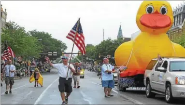  ?? DIGITAL FIRST MEDIA FILE PHOTO ?? Members of the Pottstown Rotary Club with their big rubber duck in a previous Independen­ce Day Parade.