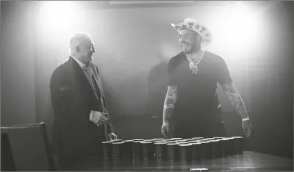  ?? RENATO RIMACH/AP ?? DALLAS COWBOYS OWNER JERRY JONES (LEFT) and singer/rapper Post Malone take a break between takes for the 2021 Dallas Cowboys schedule release video at The Star in Frisco, Texas on April 8, 2021.