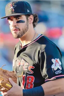  ?? JIM THOMPSON/JOURNAL ?? Albuquerqu­e’s Mike Tauchman has hit nine home runs this season after having hit nine combined in his first four seasons. Manager Glenallen Hill has called him the team MVP.