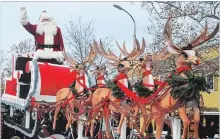  ?? MIKE ZETTEL NIAGARA-ON-THE-LAKE ADVANCE FILE PHOTO ?? Santa Claus will be making his way down Queen Street Saturday.