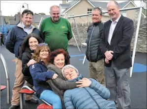  ?? Photos by Declan Malone ?? Am Spraoi members Claire GalvinO’Shea, Tor Cotton, Neasa Uí Mhoráin, Laurence Wetterwald, Mark Grealy and Cllr Seamus Cosaí Mac Gearailt with (back left) Vincent Foley of Kerry County Council and JJ Browne of Browne Bros Constructi­on at the opening of...