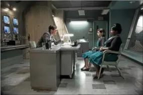  ?? PHOTO BY KERRY HAYES COURTESY OF FOX SEARCHLIGH­T PICTURES ?? Shown in a scene from “The Shape of Water” from left are Michael Shannon, Sally Hawkins and Octavia Spencer.