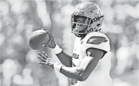  ?? BOB DONNAN, USA TODAY SPORTS ?? Louisville quarterbac­k Lamar Jackson threw for 295 yards and rushed for 162 in last season’s meeting with Clemson.