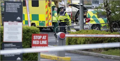  ??  ?? Emergency services staff at Cherrywood on Sunday evening.