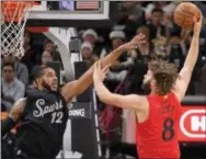  ?? DARREN ABATE — THE ASSOCIATED PRESS ?? Bulls center Robin Lopez (8) shoots against Spurs forward LaMarcus Aldridge during the first half Sunday in San Antonio.