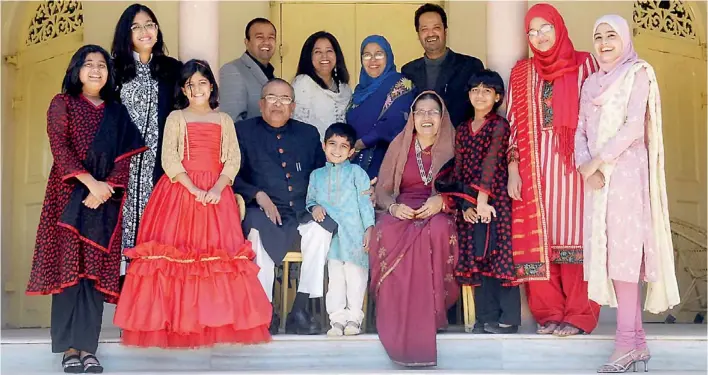  ??  ?? Front row, from left; Omaimah Ali Khan (granddaugh­ter), Rooshan Fatima (granddaugh­ter), Mr Zahid Ali khan (centre, seated), Muhammed Intekhab Ali Khan (grandson), Shams Fatima Khan (wife of Zahid Ali Khan, seated), Ayman Ali Khan (granddaugh­ter) and Ramsha Fatima (granddaugh­ter, extreme right) at the back, from left to right Rakshaan Fatima (granddaugh­ter), Amer Ali khan (son), Juveria Ali Khan (Daughter-in-law), Syeda Reema Fatima (daughter), Taqiuddin Shajee (son-in-law), and Rasha Fatima (grand daughter, spectacled)