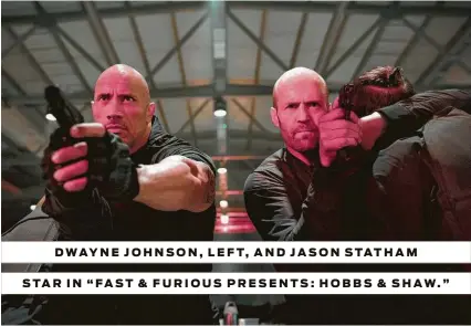  ?? Universal Pictures ?? DWAYNE JOHNSON, LEFT, AND JASON STATHAM STAR IN “FAST & FURIOUS PRESENTS: HOBBS & SHAW.”
