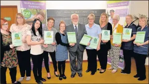  ??  ?? Staff from some of the care homes in the borough which received recognitio­n for quality of care from Leicesters­hire County Council proudly show off their certificat­es which were presented by Councillor Kevin Feltham