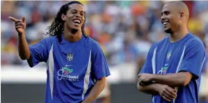  ?? — AP ?? Ronaldo (right) and Ronaldinho helped brazil win the 2002 World Cup.