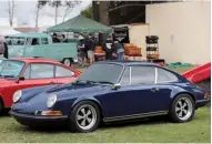  ??  ?? Far right: European Collectibl­es gathered together a beautiful pack of Porsche Speedsters, all of which were genuine, naturally
Right: We liked the appearance of the blue 911 coupé, looking aggressive with its dark tinted windows