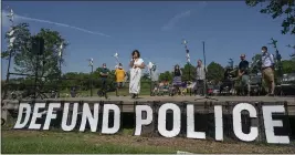  ?? JERRY HOLT — STAR TRIBUNE ?? On June 7, Alondra Cano, a City Council member, speaks during “The Path Forward” meeting at Powderhorn Park on June 7 in Minneapoli­s.