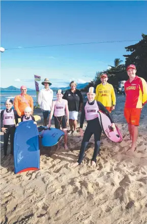  ??  ?? Cairns Surf Club members Clancy Ross, 8, Emmylou Ross, 6, Kye Yeabsley, Paul Mead, Logan Stevens, 14, Fiona Grant, Hamish Mead, 10, and Bob McPhail with profession­al lifeguard Marty Dahlstrom at Palm Cove beach. Picture: Brendan Radke