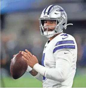  ??  ?? Cowboys quarterbac­k Dak Prescott will not know until game day if ESPN wants to mic him up for the ‘MNF’ broadcast. TIM HEITMAN/USA TODAY SPORTS