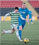  ?? ?? Celtic’s Ben Doak takes the ball past Stuart Hunter (Bo’ness)