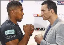  ??  ?? UP TO THE TASK: Joshua (left) is favourite to beat his Ukrainian opponent on Saturday but Klitschko insists that he is also hungry for success and will relish the contest