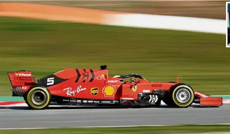  ??  ?? In full flow: Sebastian Vettel (left and inset) returned the fastest time after 169 laps in his new Ferrari SF90 car at the Circuit de Catalunya in Barcelona on Monday. — Reuters