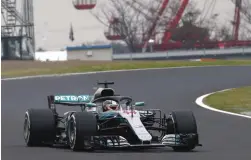  ?? AFP ?? British driver Lewis Hamilton of Mercedes at the practice session of the Formula One Japanese Grand Prix at Suzuka. —