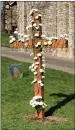  ?? ?? A remembranc­e cross in the grounds of Cathcart Old Parish Church