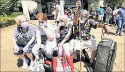  ??  ?? ANXIOUS TIMES: Residents of Galveston, Texas, prepare to board a bus for Austin as they evacuate Tuesday ahead of Hurricane Laura.