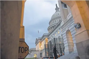  ?? ZACH GIBSON, GETTY IMAGES ?? Lawmakers have left the U. S. Capitol for their August recess despite sending almost nothing to the president’s desk.