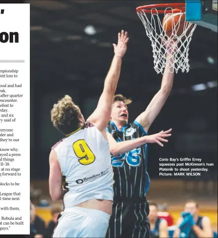  ?? Picture: MARK WILSON ?? Corio Bay’s Griffin Errey squeezes past McKinnon’s Ivan Platenik to shoot yesterday.